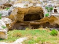 Ancient houses carved in the rock in Ginosa, Italy Royalty Free Stock Photo