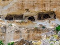 Ancient houses carved in the rock in Ginosa, Italy Royalty Free Stock Photo