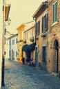 Ancient houses on the picturesque Via Marecchia in Borgo San Giuliano, Rimini, Italy