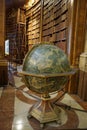 Ancient huge globe standing in the main hall of the National Austrian Library in the Hofburg Palace Royalty Free Stock Photo