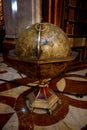 Ancient huge globe standing in the main hall of the National Austrian Library in the Hofburg Palace Royalty Free Stock Photo