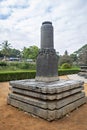 Ancient huge monolith stone pillar in front of Chennakesava temple in Belur, Karnataka, India