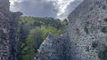 Ancient Hugstein Castle Ruins Overlooking Florival Valley, Alsace, with Springtime Verdure and Dynamic Sky Royalty Free Stock Photo