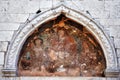 Ancient icon on the wall of an ancient Christian temple. Croatia Royalty Free Stock Photo