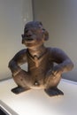 Ancient indigneous ceramic of an anthropomorphic sitting man