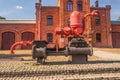Ancient industrial steam machine displayed outside old factory Royalty Free Stock Photo