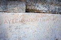 Ancient inscription on a wall of ancient theater in the city the Hierapolis, Turkey