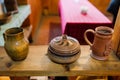 Ancient interior of a rural house in an ethnographic park. Old stove