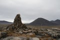 An ancient Inuit inukshuk inuksuk that serves as a landmark for travellers, located near Qikiqtarjuaq, Baffin Island