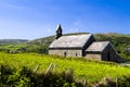 Ancient Irish church in blue sky