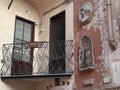 Ancient iron balcony of the church of San Silvestro in Capite to Rome in Italy.