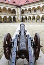 Ancient iron cannon at the royal castle in Niepolomice, Poland.