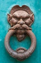 Ancient iron doorknocker face