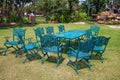 Iron green chairs and table outdoor in the garden Royalty Free Stock Photo