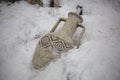 Ancient jug in the snow. Amphora for storing wine Royalty Free Stock Photo