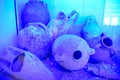 Ancient jugs and amphoras raised from the bottom of the sea. Antalya Antiquities Museum Royalty Free Stock Photo