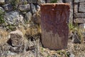 An ancient khachkar of 5-7 centuries in the Tsakhatskar monastery in the mountains of Armenia