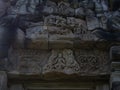 Ancient khmer art sand stone carving Phimai historical park. Royalty Free Stock Photo