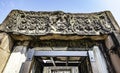 Ancient Khmer-era sandstone carvings above the gates of Prasat Hin Phimai in Nakhon Ratchasima