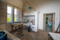 Ancient kitchen in a old country house with fireplace hood