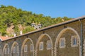 The ancient Kykkos monastery is the main shrine of Cyprus .The stone bell tower located on the mountain slope over the monastery, Royalty Free Stock Photo