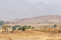 Ancient Kyrgyz cemetery with stone buildings in Shabdan village, Kyrgyzstan