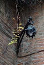 Ancient lamp in the yard of the Romeo and Juliet house in Verona, Italy