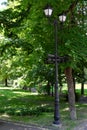 An ancient lantern with road signs in the historical center of Chernigov Royalty Free Stock Photo