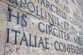 Ancient Latin inscription on the outside wall of Ara Pacis wall in Rome Royalty Free Stock Photo