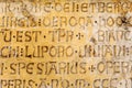 Ancient latin script on a house wall in Florence Royalty Free Stock Photo
