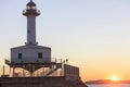 Ancient lighthouse, Far de la Banya in port of Tarragona,Spain.