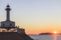 Ancient lighthouse, Far de la Banya in port of Tarragona,Spain.