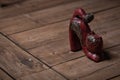 Ancient looking wooden cat on table