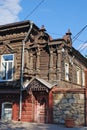 The ancient lordly inhabited wooden house on Karl Marx Street in the city of Syzran. Summer city landscape. Samara region.