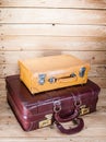 Ancient luggage on wood floor background is wood Royalty Free Stock Photo