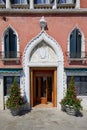 Ancient and luxury hotel Danieli entrance in a sunny day in Venice, Italy