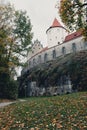 Fussen, Germany 02.11.2023: Ancient Majesty: Castle Perched on the Cliff Amidst Autumnal Splendor