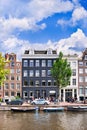 Ancient mansions at historic canal belt of Amsterdam, Netherlands. Royalty Free Stock Photo