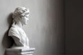 Ancient marble statue of a young woman near empty wall. Greek sculpture with copy space for text. Antique female sculpture, bust, Royalty Free Stock Photo