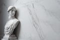 Ancient marble statue of a young woman near empty wall. Greek sculpture with copy space for text. Antique female sculpture, bust, Royalty Free Stock Photo