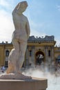 Ancient marble woman statue in thermal baths SzÃÂ©chenyi, Budapest, Hungary. Medieval art . Woman sculpture back view.