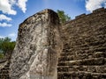 Ancient Mayan sculpture with hieroglyphic writing in Calakmul, M Royalty Free Stock Photo