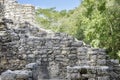 Ancient Mayan stone wall relics in Coba Ruins, Mexico Royalty Free Stock Photo