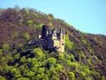 Ancient medieval castle on a mountain against a blue sky, Germany, castles on the banks of the Rhine,