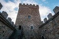 Ancient medieval fortress tower with stone walls Royalty Free Stock Photo