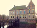 Ancient medieval stone fortress surrounded by water channel, castle Vorden, Netherlands, Europe Royalty Free Stock Photo