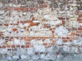 Ancient medieval stone masonry. Texture of a fragment of a wall of an old structure. A background for design and creative work. De Royalty Free Stock Photo