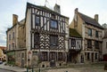 Ancient medieval timber-framed house in old french village Noyers