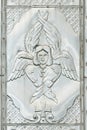 Ancient metal icon of seraphim, on the facade of the old church Royalty Free Stock Photo
