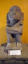 Ancient mexican sculpture of a man